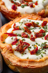 Mini Quiche perfect for brunch on black stone table