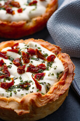 Mini Quiche perfect for brunch on black stone table