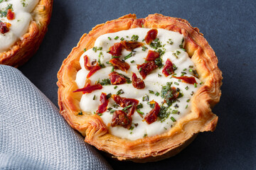 Mini Quiche perfect for brunch on black stone table