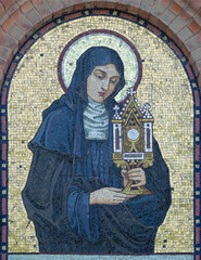 VIENNA, AUSTIRA - JULI 5, 2021: The mosaic of St. Juliana of Liege on the facade of St. Anthony church from begin of 20. cent..