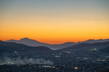 View of smoke over the big city at dusk