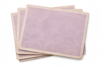 Vintage, translucent photographic prints displaying weathered edges, inviting personal narratives and reminiscing about past moments