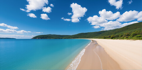 A sandy beach during the day with waves and a sky and clouds in the background. AI generated.