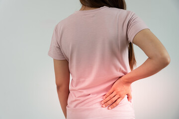 woman holding back while and suffer from unbearable pain health and problems, chronic back pain,...