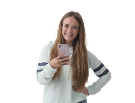 Happy young woman using her smartphone