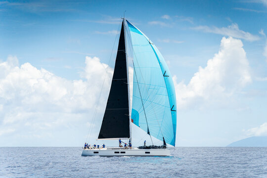 Performance Sailing yacht racing in Antigua Sailing Week in the caribbean, with full sails 