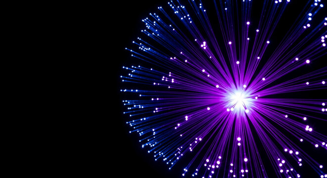 Purple and blue fiber optic strands radiate from central light source against black background, showcasing technology, connection, and innovation