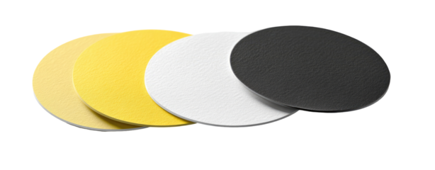 Three circular, layered discs in yellow, white, and black