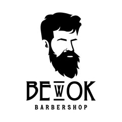 A minimalist monochrome logo design featuring the silhouette of a stylish man with a full beard and a modern haircut for a barbershop or men's grooming salon