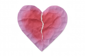 Crumpled pink paper heart with vertical tear symbolizing heartbreak, resting against transparent backdrop