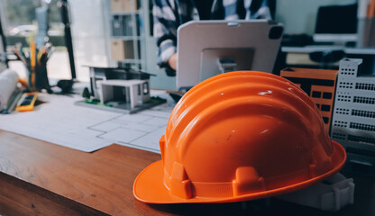 Construction and structure concept of engineer working drawing on blueprint meeting for project...