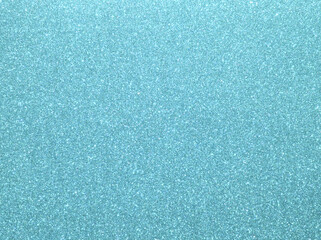 Blue sparkle background. Pastel blue glitter background. Blue glimmer. Twinkle texture. Glitter surface. Glimmer layout. Celebration layout. Diamond luxury surface. Turquoise holiday background.