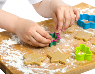  Child Cutting Cat Treats with Cookie Cutter, Side Angle, isolated