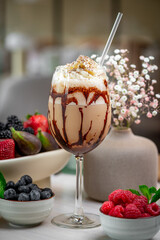 Delicious iced coffee with whipped cream. A refreshing iced coffee topped with whipped cream and...