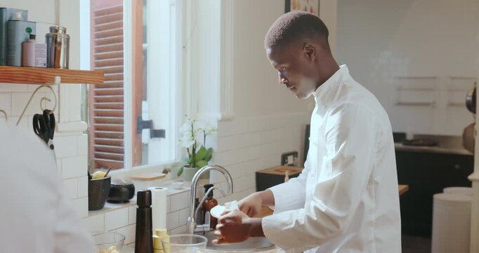 Cuisine, hand washing or black man in kitchen, safety protocol or strict attention for food preparation. Hygiene, food or chef in restaurant with compliance, sanitize or clean for cross contamination
