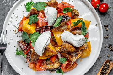 Spring salad with fresh colors. Vibrant salad featuring fresh tomatoes, creamy cheese, and roasted...