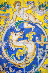 Ceramic panel depicting a cherub and a hippocampus in Seville