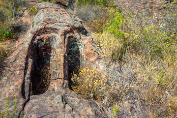 Megalithic stone tombs graves in wilderness landscape at Carrasqueira Necropolis Necropole...