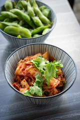Kim chi on the table with edamame.