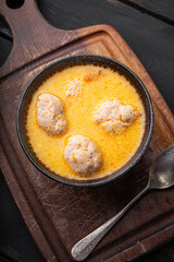 Soup with meatballs, potatoes and cheese. Meatballs in thick vegetable soup Albondigas. Mexican and Spanish, European and Russian cuisine. Vertical photo