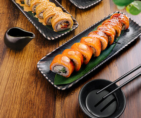 Colorful sushi rolls served on elegant plates at a Japanese restaurant