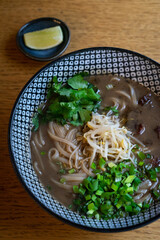 Classic pho bowl with noodles and flavorful broth.