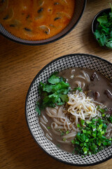 Traditional Vietnamese pho soup with fresh herbs.