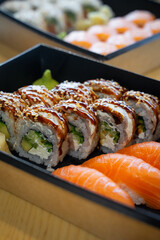 sushi set with wasabi in delivery box.