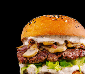 Juicy mushroom and beef burger served on sesame seed bun with fresh toppings
