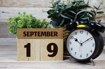 Wooden Calendar Showing the Date of September 19th. Day 19 of September month
