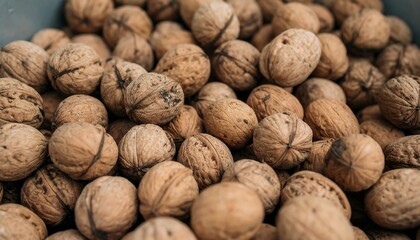 Close-up of many walnuts in a container