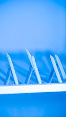 Close-up of metal tools, cool blue tones
