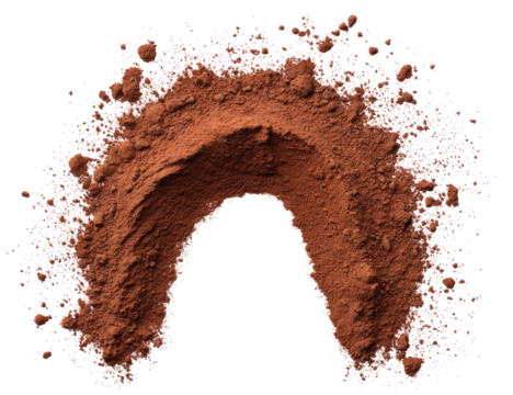 A dark, reddish-brown powder forms a horseshoe-shaped arch, surrounded by scattered particles