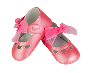 Close-up of pink baby shoes, presented on a transparent background. The image is simple, drawing all focus to the tiny, delicate footwear.  Perfect for use in projects related to baby products.