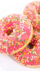 Close-up of pink glazed donuts