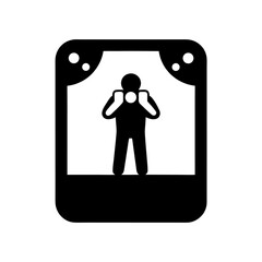 Silhouetted Figure Holding Antique Camera Against Vibrant Sunset Capturing Mountain Range in Nostalgic Light