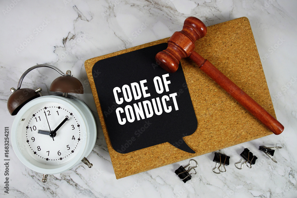 Poster code of conduct text on speech bubble with alarm clock and wooden gavel on marble background