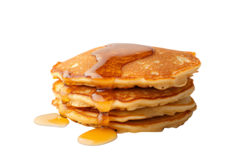 Stack of fluffy pancakes drizzled with syrup on a white isolated background.