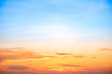 Beautiful , luxury soft gradient orange gold clouds and sunlight on the blue sky perfect for the background, take in evening,Twilight, Large size, high definition landscape photo