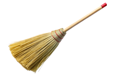 Traditional straw bristle broom with wooden handle isolated on a plain background for cleaning and decor transparent background