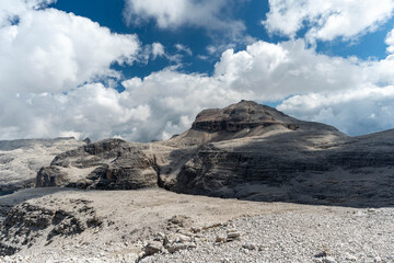 Rocky mountain landscape under dramatic cloudy sky
