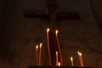 burning candles in an orthodox church