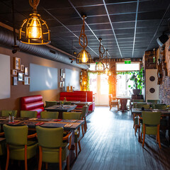Sunny empty restaurant interior with no people tables sun restaurant