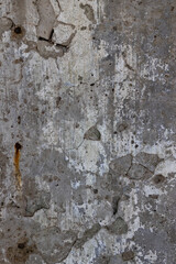 Close-up of a weathered concrete wall with peeling paint and rough texture, neutral background, clear negative space, clean composition, balanced framing, minimalist layout, editorial friendly