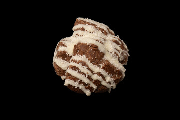 Profiteroles with coconut cream on a black background.