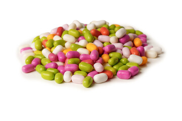 Sweet multicolored candies isolated on white background.