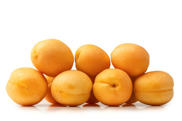 Ripe juicy orange apricots isolated on white background.