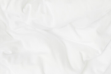 Texture of white blanket and bedding sheet with crumpled or messy in bedroom after wake up.
