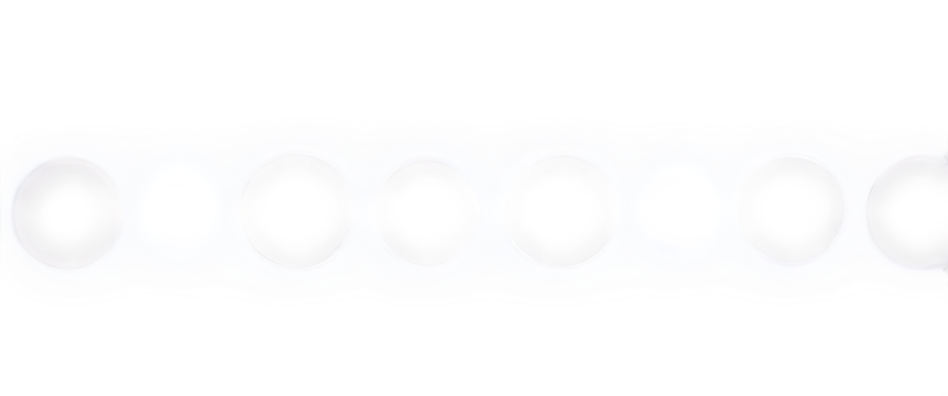 Abstract pattern of bright white oval bokeh lights against a dark black background