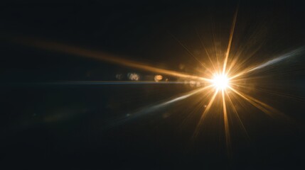 Obraz premium Dramatic golden light burst with sharp rays and lens flare effect, cinematic starburst overlay for video ads, social media, marketing, business promotion